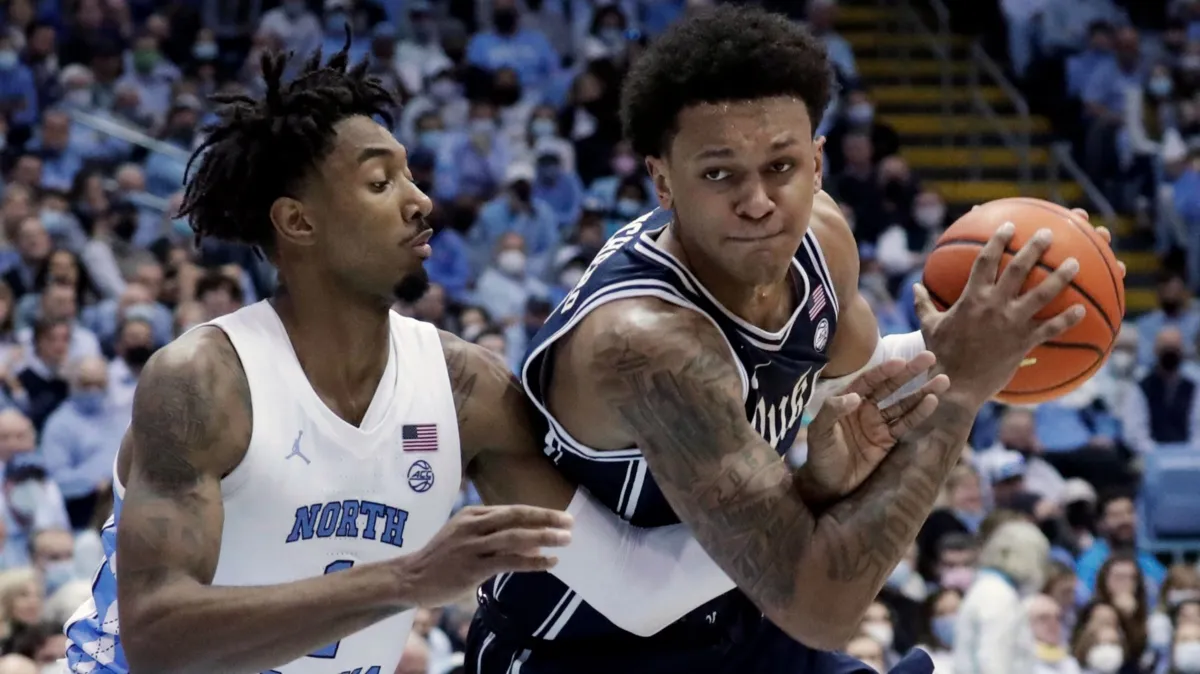 Duke vs. North Carolina (2022) poster — movie on Disney+